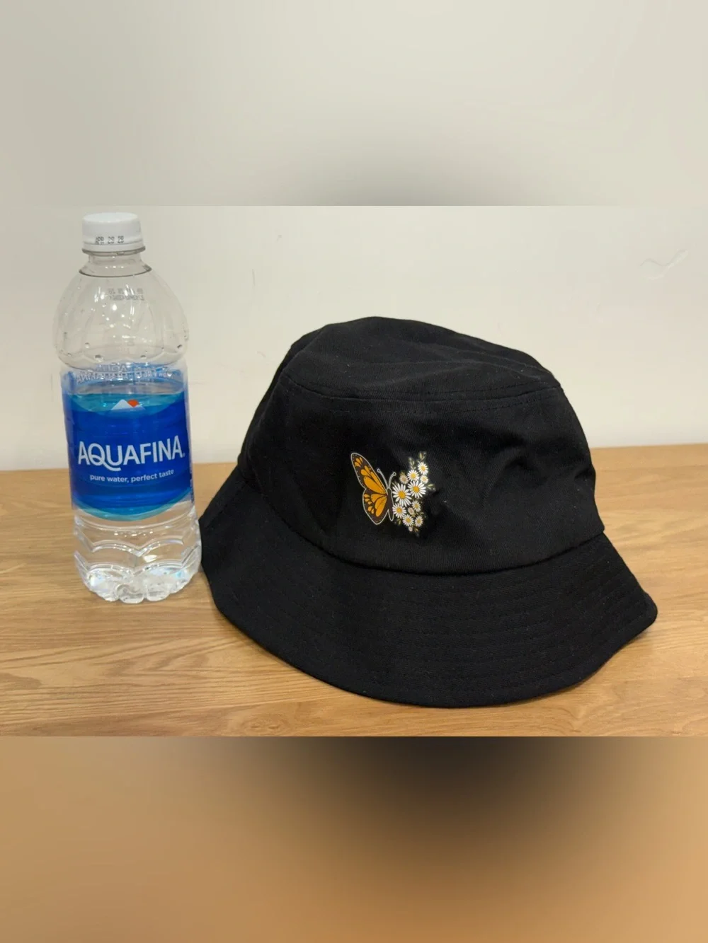 Black Bucket Hat with Orange Butterfly & White Daisy Design